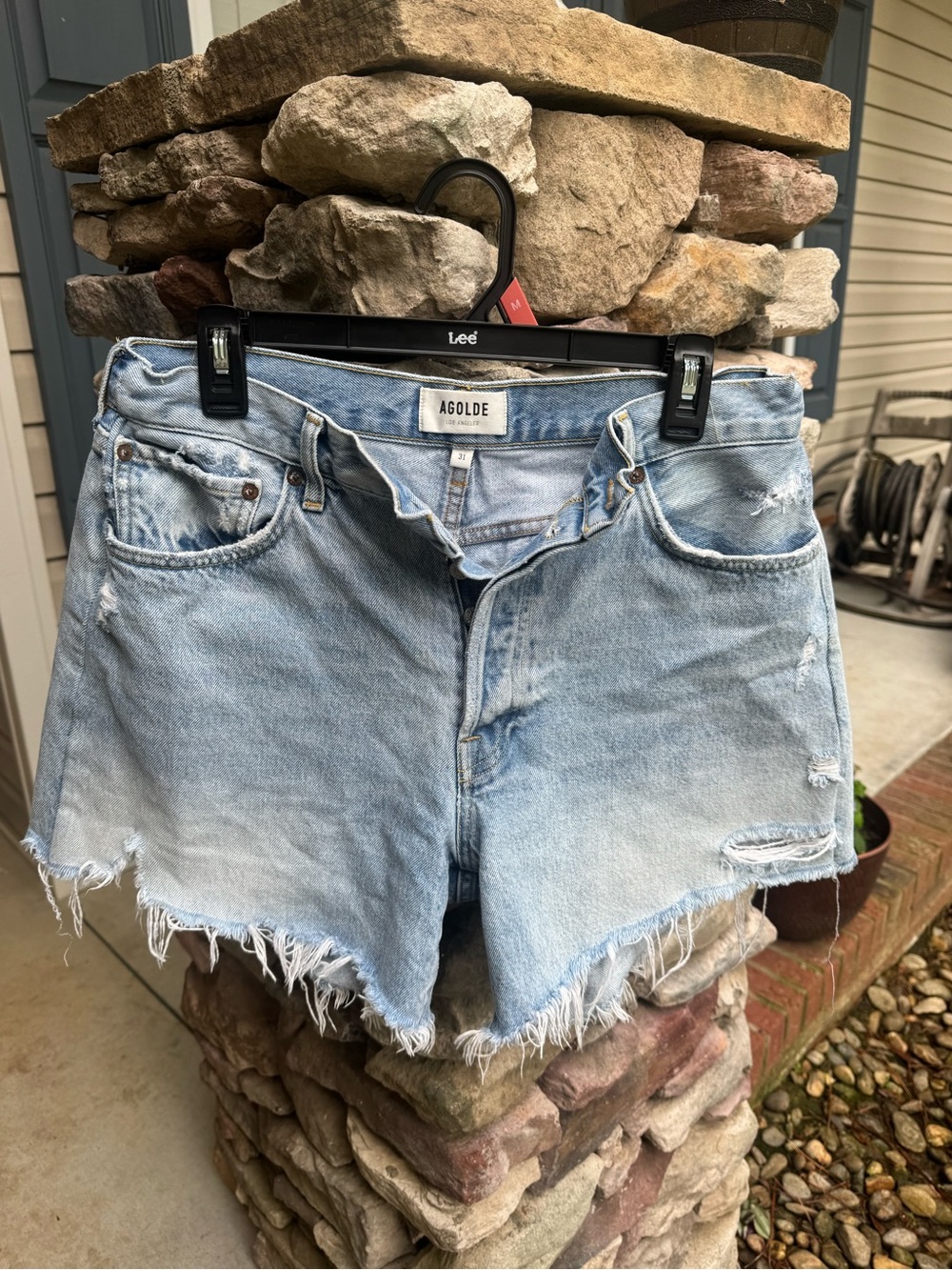 Agolde Light Blue Distressed Raw Hem Denim Shorts